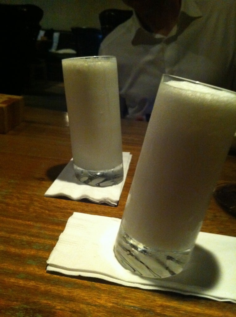 Coconut lemonade in leaning glasses