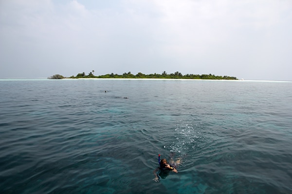 Snorkeling on the reef in front of Anantara's private island