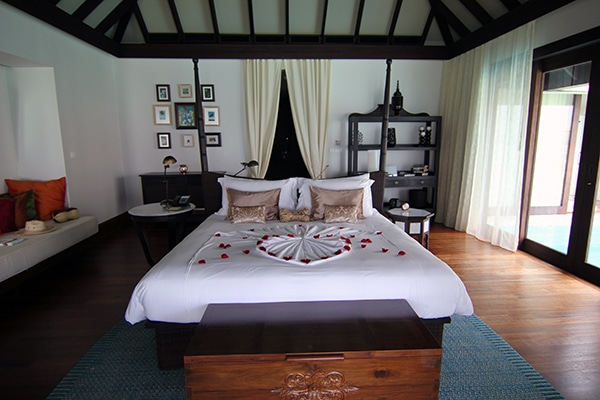 Romantic bedroom in our over water pool villa