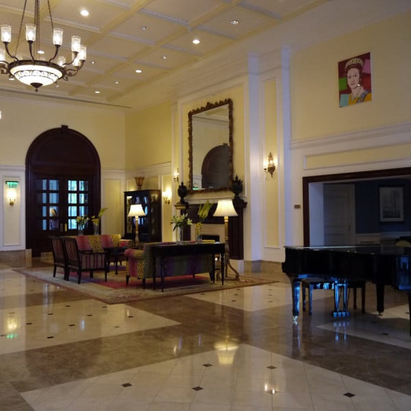 The regal lobby features marble floors and soaring ceilings.