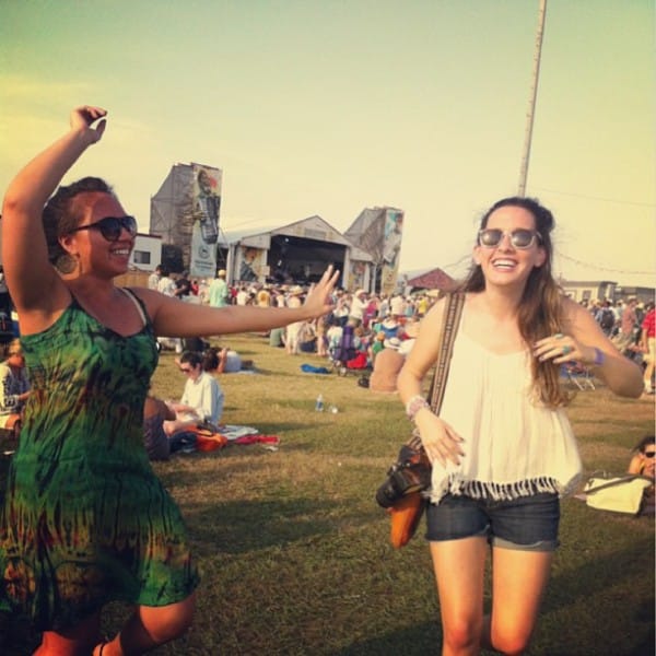 Dancing at Jazz Fest with The Sheraton-sponsored “Fais Do Do Stage” in the background (Kristina Dzenis, Amanda Matte)