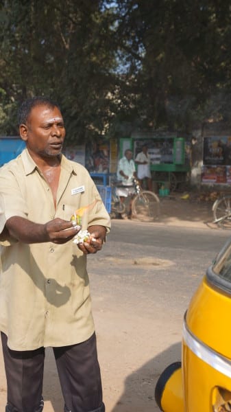 Driver blessing his Rickshaw before the day's business.