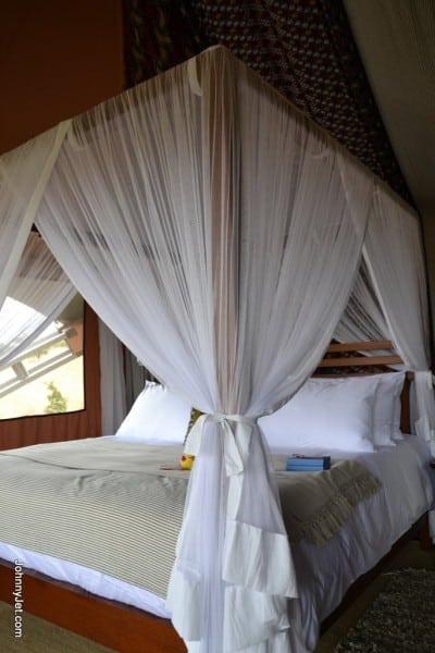Four poster bed with mosquitto netting