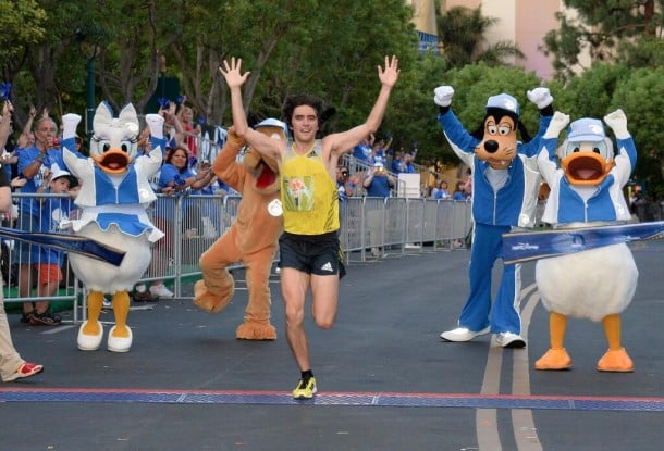 Jimmy Grabow crosses the finish line and wins the Disneyland Half Marathon