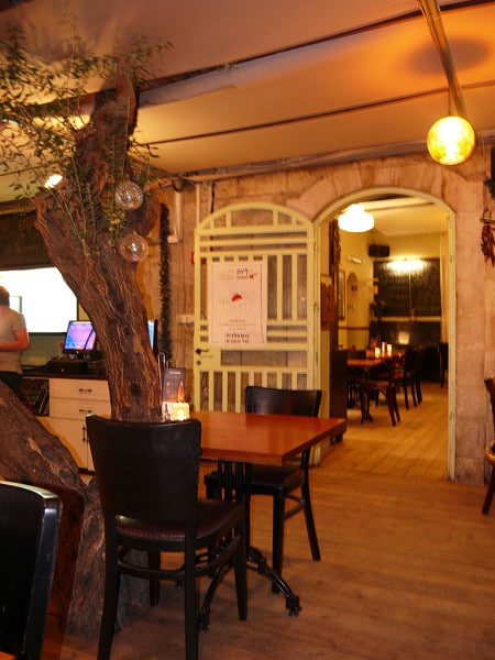 A tree grows in the dining room at Link restaurant