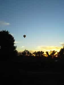 A hot air balloon at sunset