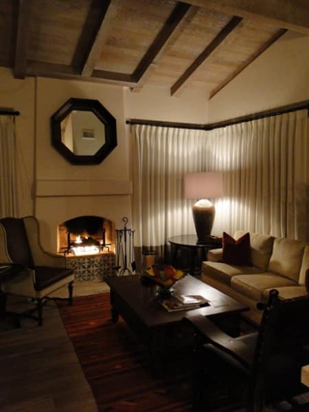 Evening turndown service includes lighting the fireplace in your casita