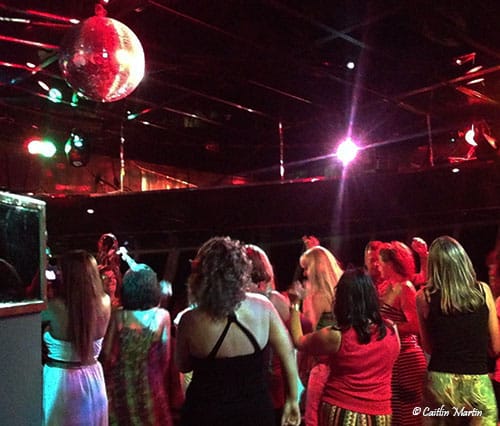 Passengers dancing the night away as we watched with our delicious drinks!
