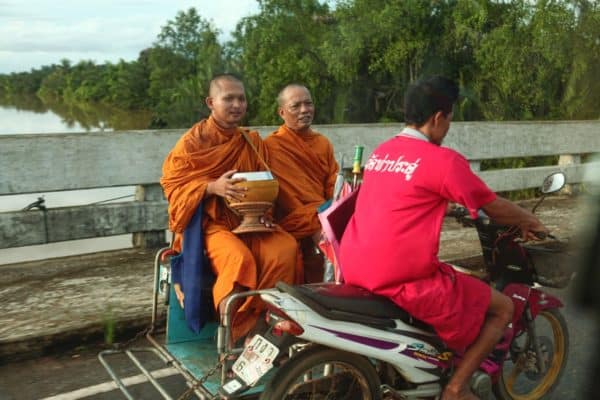 Monks on motorcycle