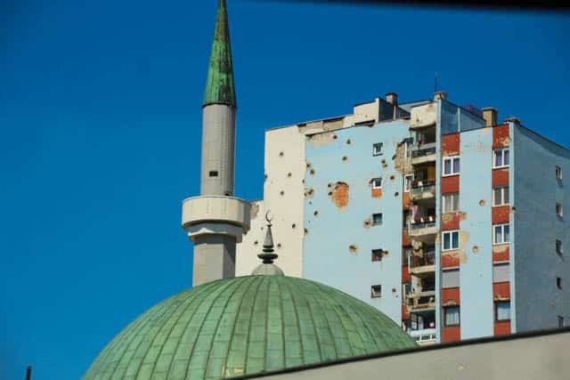 Mortar marks on an apartment building in Sarajevo, Bosnia-Herzegovina