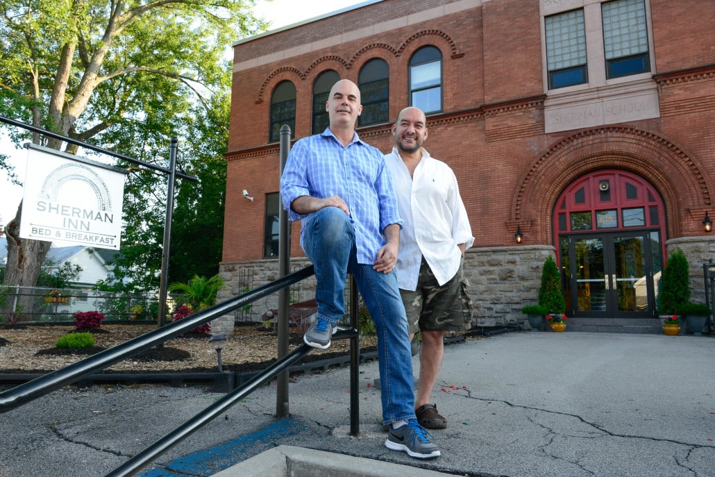 Owner John Wade (left) and partner Carlos (who cooks the included breakfast) in front of the Sherman Inn