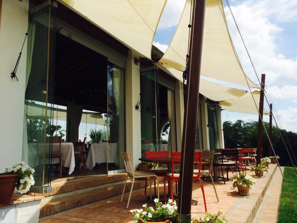 Outdoor dining terrace at Avignonesi