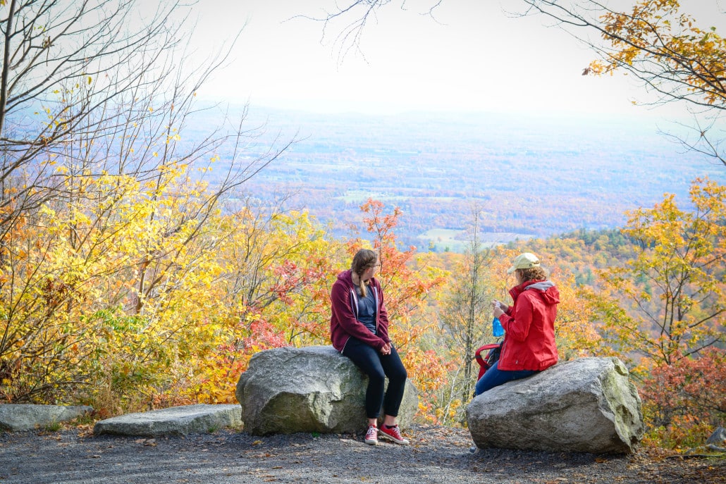 Visitors to Minnewaska State Park look out over the Hudson Valley from atop the Shawangunk Ridge