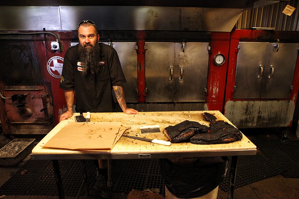The pitmaster at Lockhart Smokehouse
