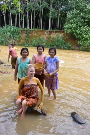 In the river with local children