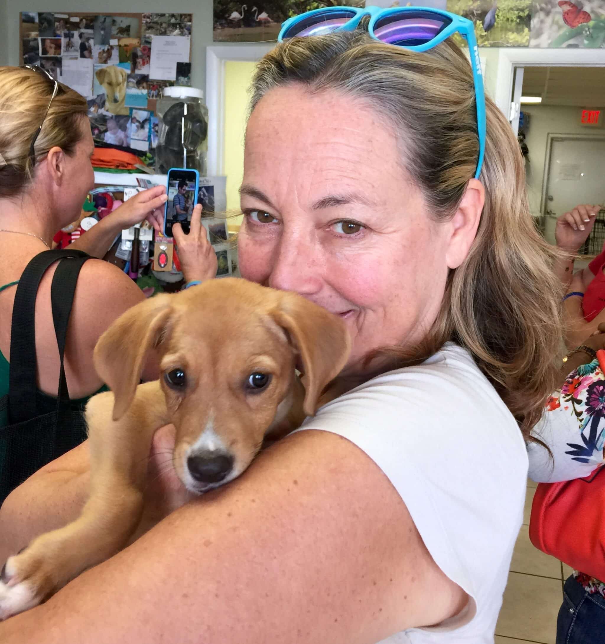 Georgie Jet with potcake pup