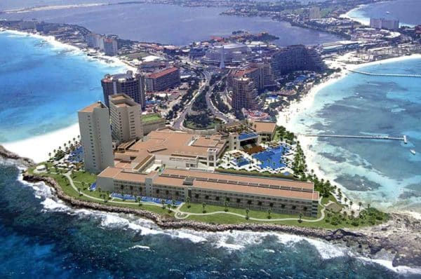 An aerial view of the Hyatt Ziva Cancun shows its spectacular location on a peninsula surrounded on three sides by the Caribbean Sea (Credit: Hyatt Ziva Cancun)