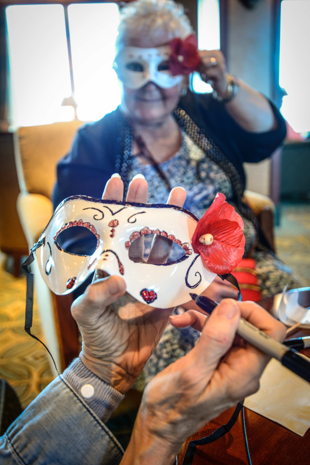 Ladies making masks to be worn at a Puerto Vallarta arrival party