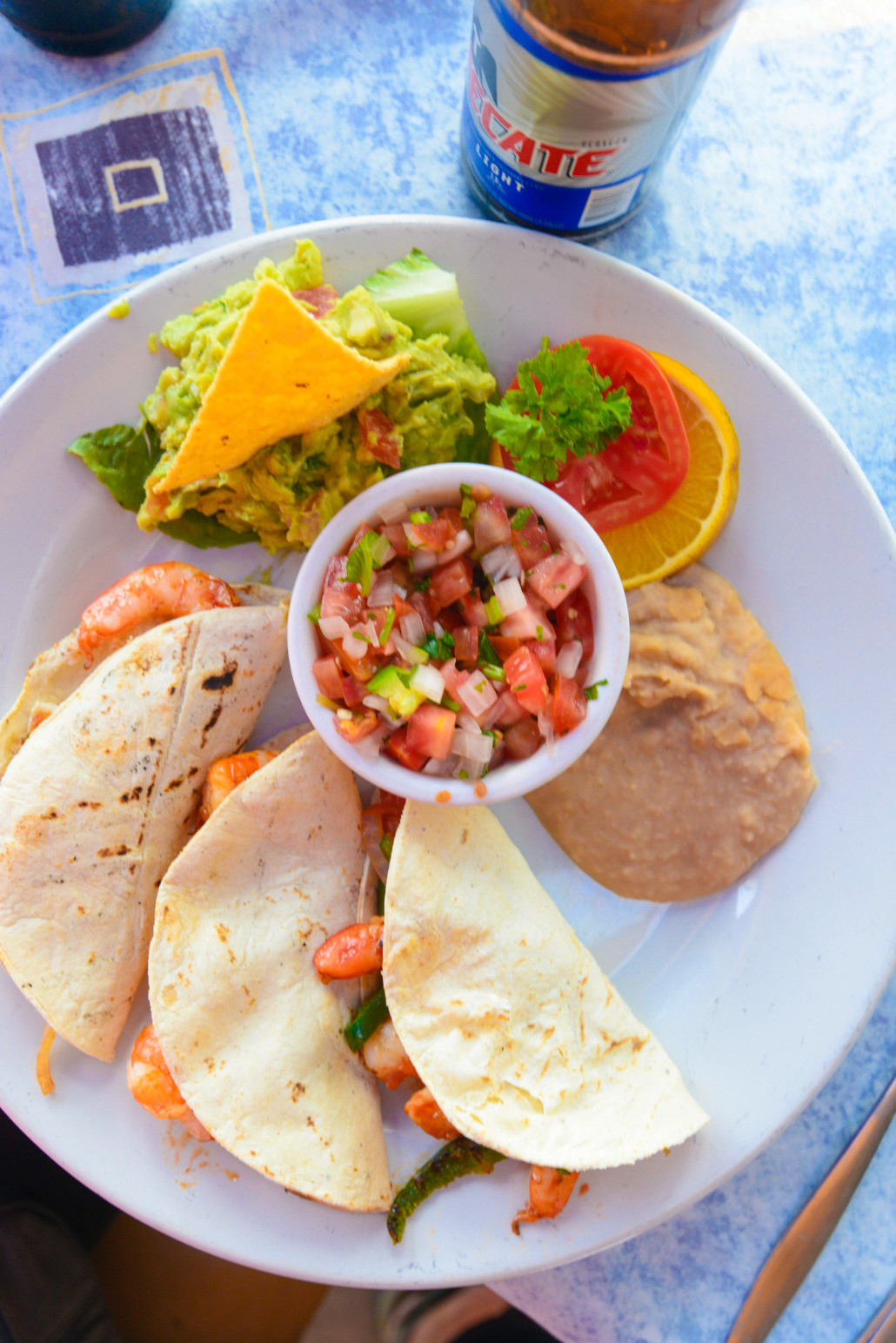 A second helping of shrimp tortillas and guacamole