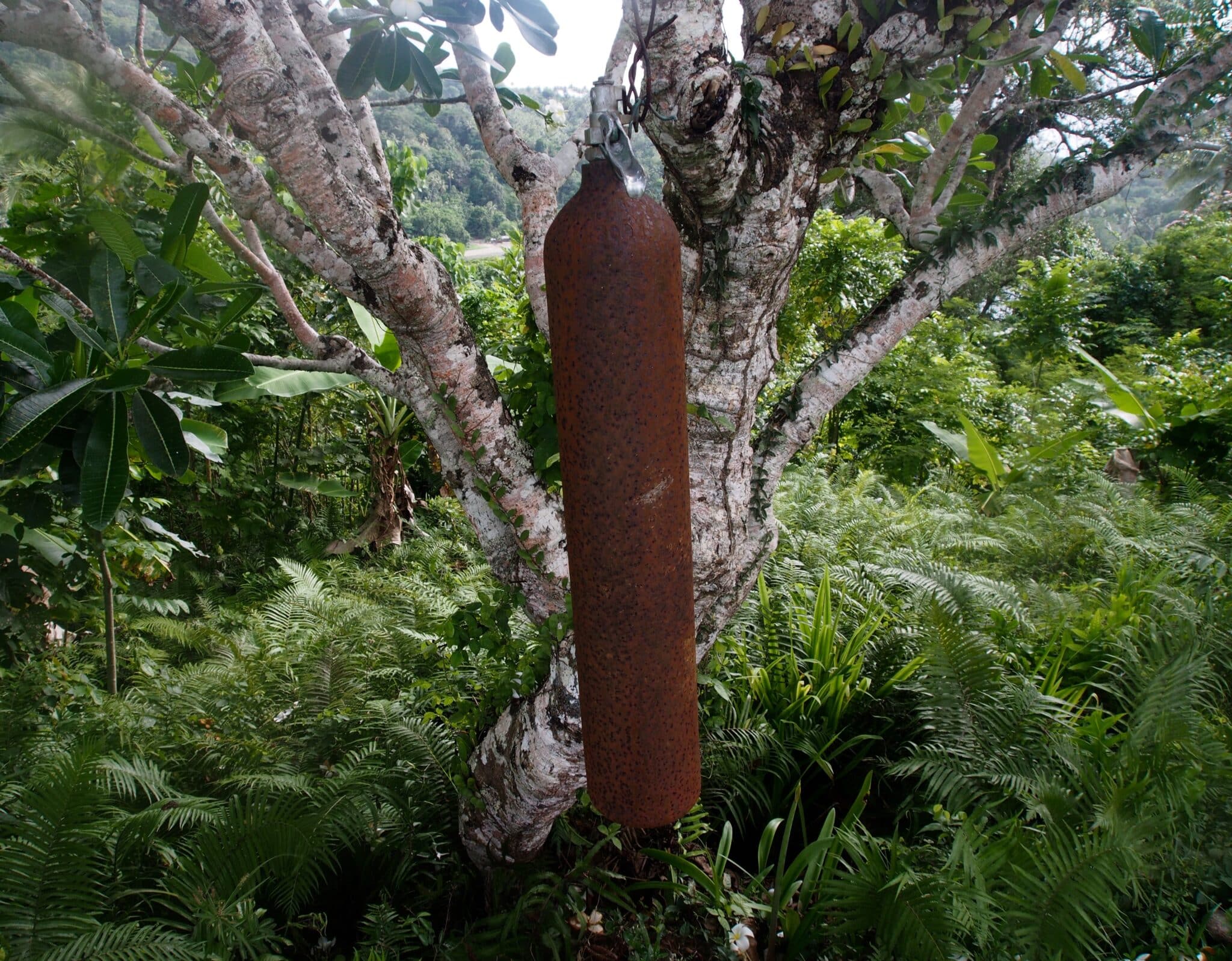 Rusting WWII relic on Kwado in Milne Bay