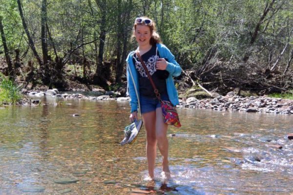 My daughter wading through Oak Creek