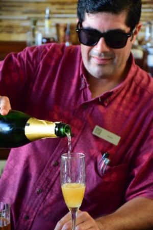 Aaron Alcala-Mosely making me a champagne cocktail