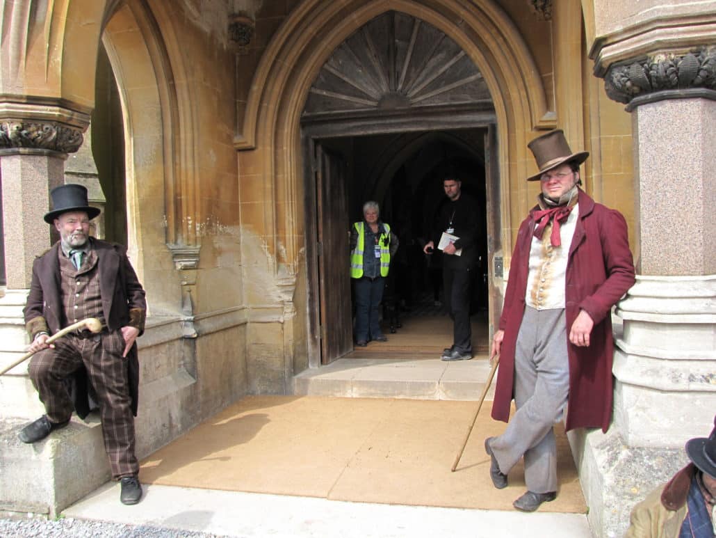 Reenactors at the entrance to the Gothic Revival Estate at Tyntesfield
