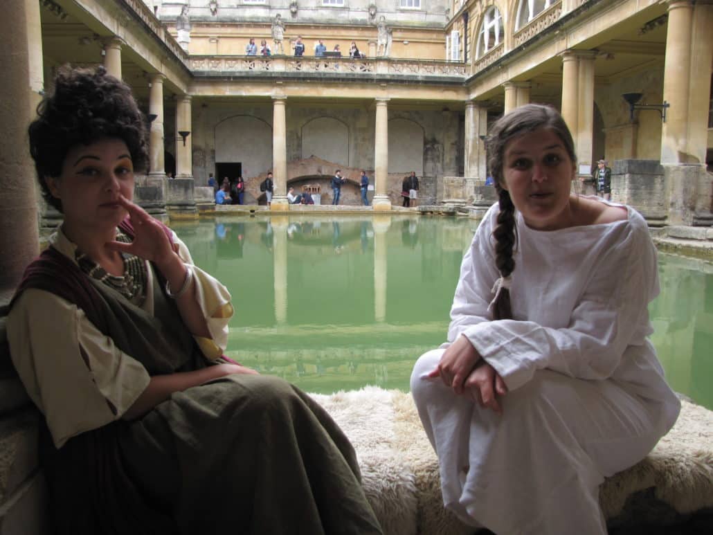 A “noblewoman,” left, and her “slave” reenact life at the baths in Bath