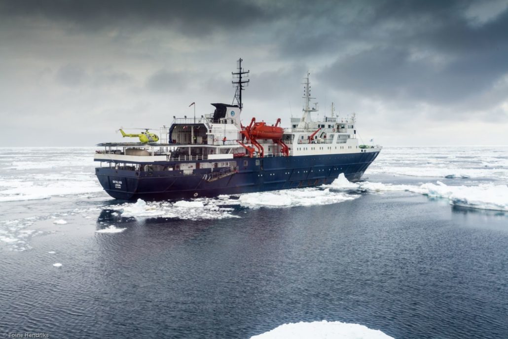 Ortelius in the Ross Sea with helicopter (Credit: Toine Hendriks and Oceanwide Expeditions)