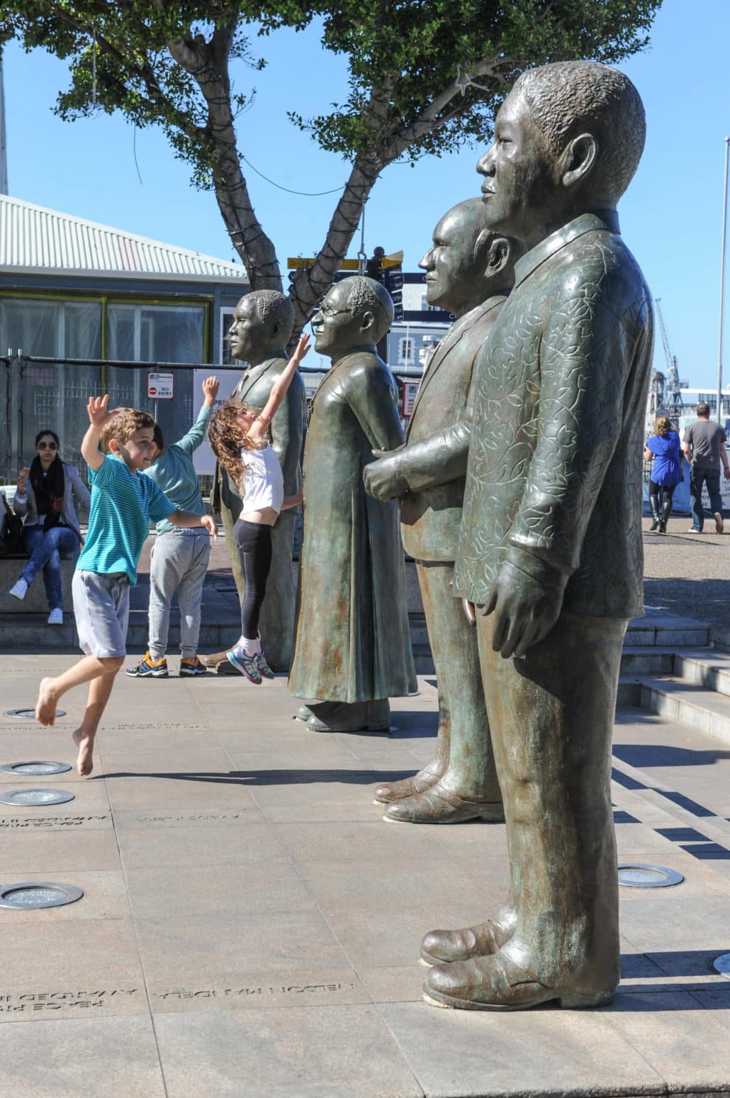 Bronze statues of four men who collectively brought down apartheid peacefully stand in the Waterfront