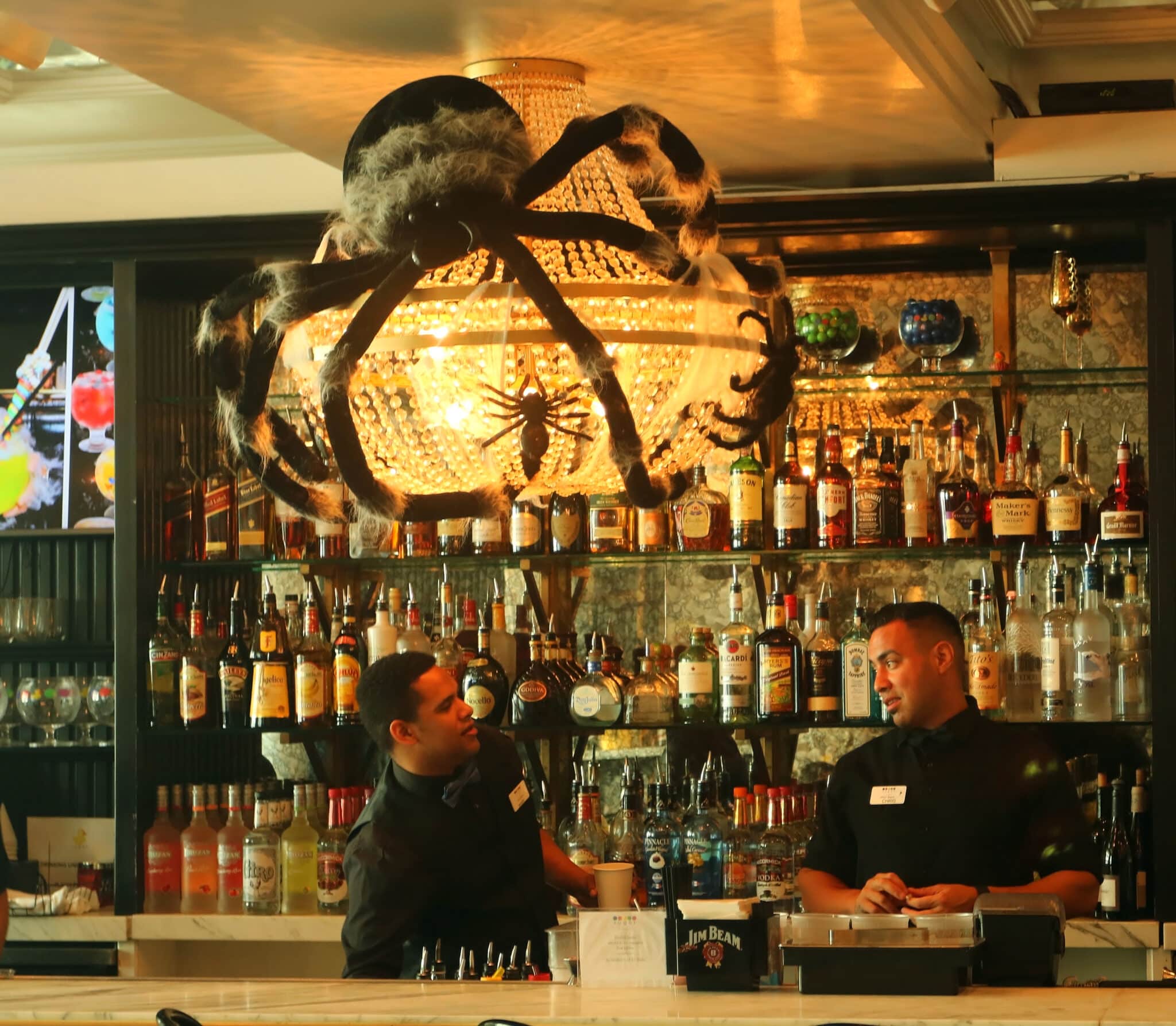 The bar at the Sugar Factory just before Halloween (notice the spider crawling on the chandelier) (Credit: Bill Rockwell)