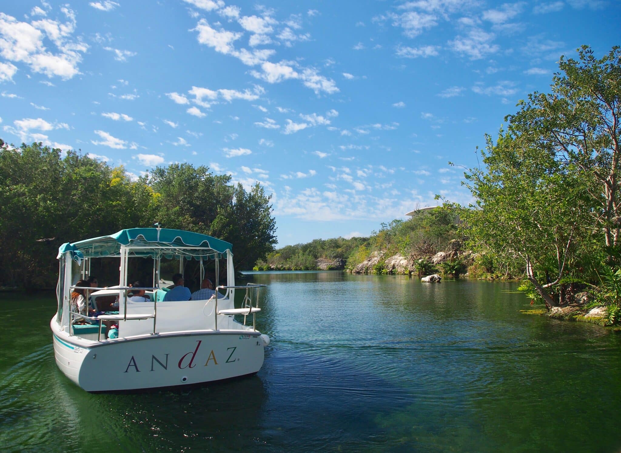 An Andaz boat leisurely shuttling guests around