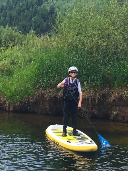 Ames masters the finer points of SUPing (like trying not to fall in...again)