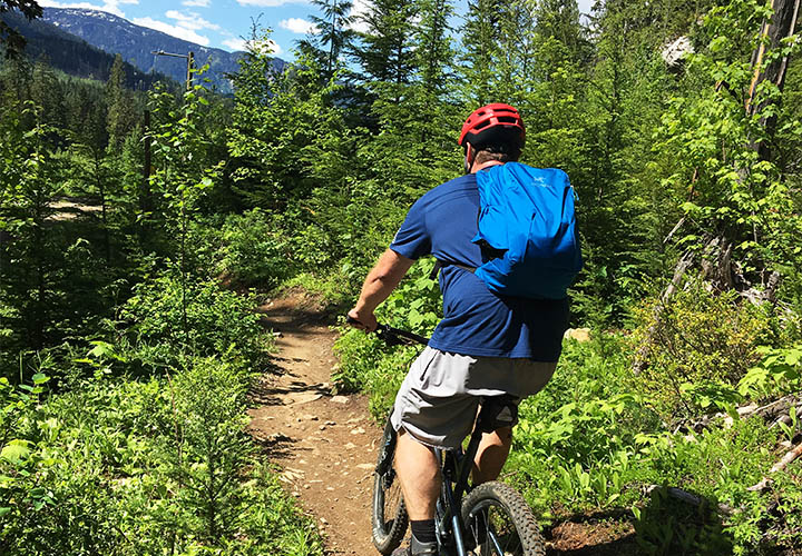 Mountain biking on Mt. Macpherson outside of Revelstoke, BC