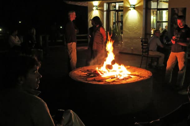 After dinner drinks by the fire at Ngorongoro Farm House