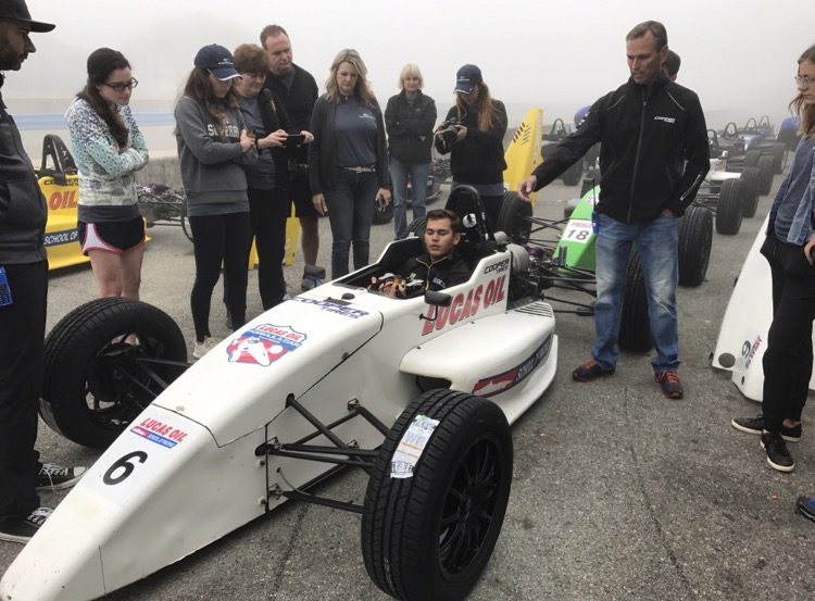 Johnny Unser talks to the class while RC Enerson demonstrates