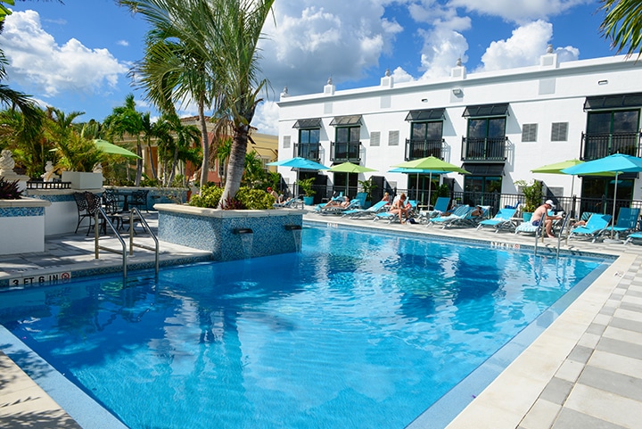 Pool and outdoor lounge area at The Inn on 5th