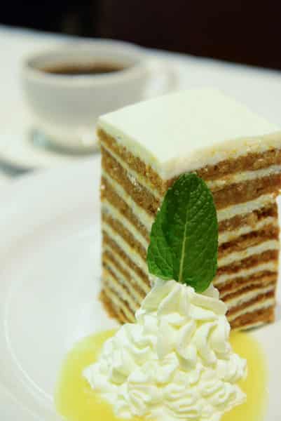 Ten-layer carrot cake with cream cheese icing and pineapple syrup