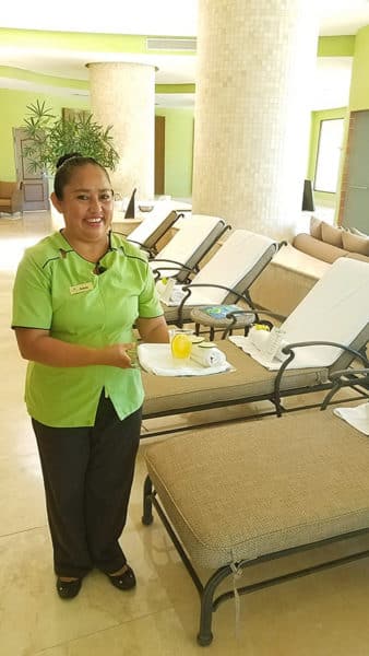Adela offers fruit-infused water while I wait for my massage at Sabila