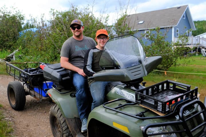 Hitching a ride to my campsite from a local named Mackinnon (Credit: Newfoundland & Labrador Tourism)