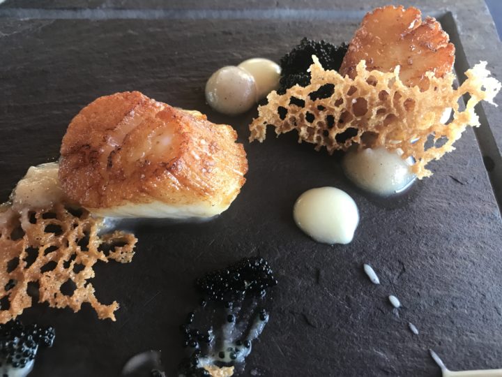 Digby scallops served on slate at Purple Thistle