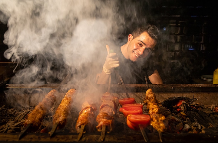 Grilling kebabs at Ali OcaKbasi